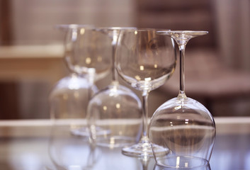 Upturned wine glasses on the table