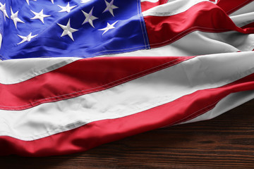 USA national flag on wooden background, close up