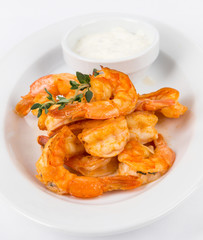 portion hot shrimps on white plate