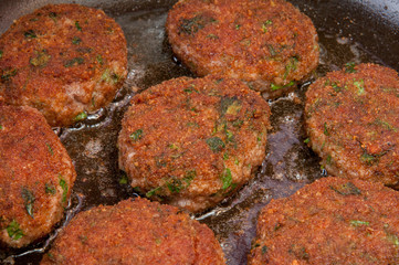 cutlets fried in a pan