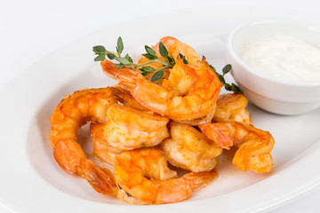 portion hot shrimps on white plate