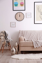 Beige sofa in the room interior