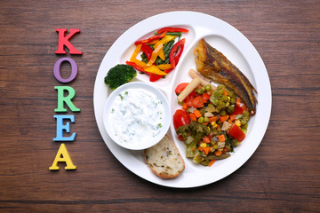 Traditional Korean lunch on wooden background