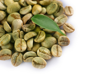 Green coffee beans on white background
