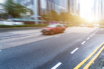 motion traffic,city buildings background,hongkong china.