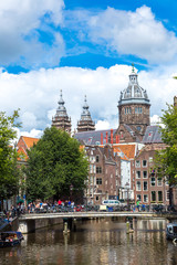 Fototapeta premium Canal and St. Nicolas Church in Amsterdam