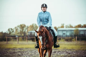 Foto op Canvas Girl riding a horse © sergo321
