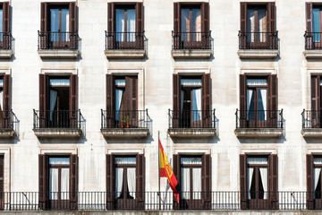 Typical windows and balconies in a house in Santander, Spain