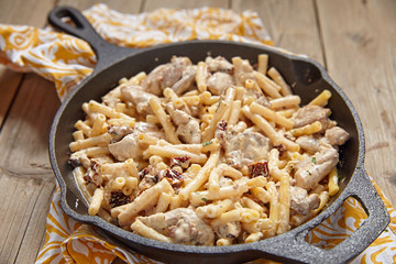 Penne pasta with chicken and cream sauce