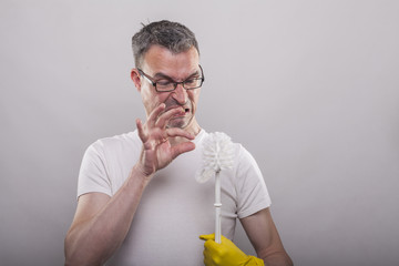 Single man with cleaning brush