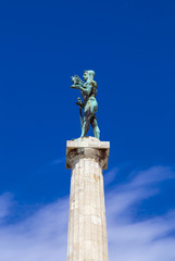 Monument sculpture of the Belgrade Winner made of bronze, located in Kalemegdan, Belgrade, Serbia