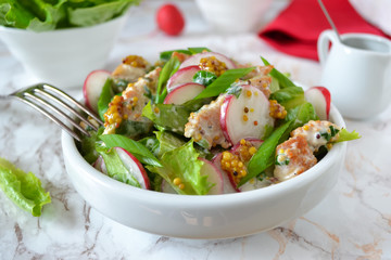 Salad with chicken, radishes and spicy mustard sauce