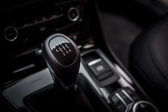 Gearshift handle in modern car black interior