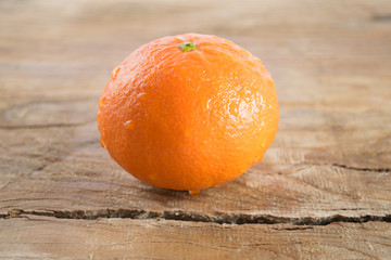 Mandarin orange (tangerine)  on wooden background