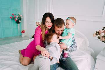 Beautiful family portrait spending time together at studio