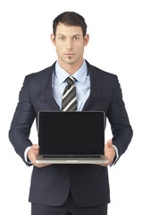 businessman holding open laptop