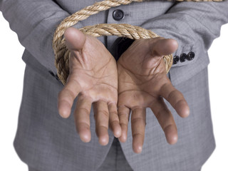 tied hand of  a businessman