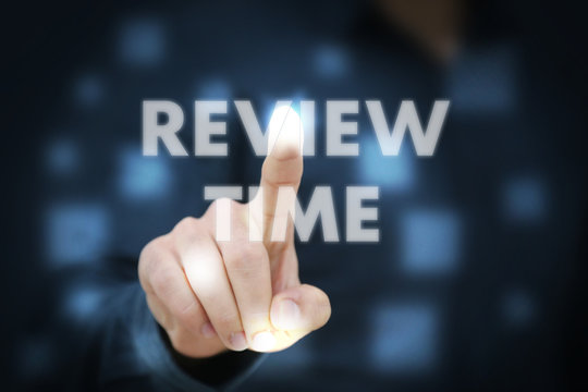 Businessman touching Review Time