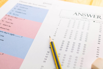pencil on answer sheet and question sheet