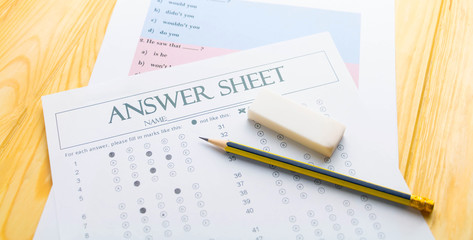 pencil on answer sheet and question sheet