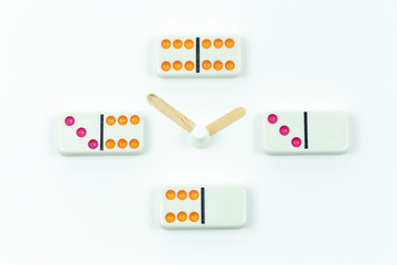 Domino Clock:
Domino wall clock made with dominoes, a popsicle stick and a tube cap. 