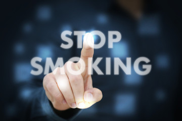 Businessman touching Stop Smoking
