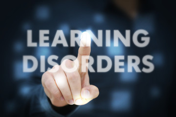 Businessman touching Learning Disorders
