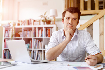 Fototapeta premium Male architect in office