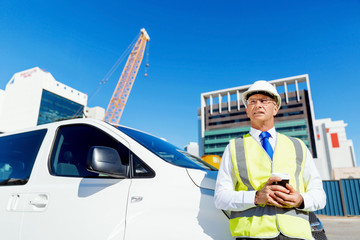 Engineer builder at construction site