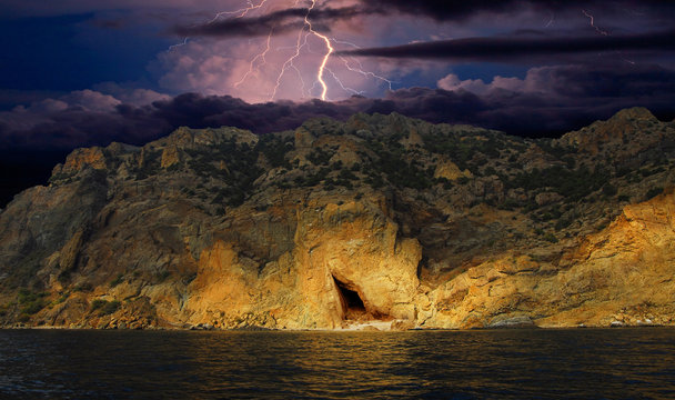 On The Cliffs Of The Kara Dagh/Storm and lightning. Crimea, a mountain massif Karadag. near Koktebel. Shore Of The Black Sea