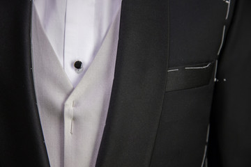 tuxedo with stitches through it at a tailor shop in Dubai, UAE