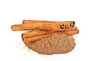Cinnamon sticks and powder on white background