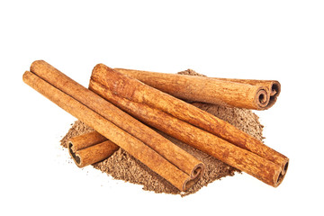 Cinnamon sticks and powder on white background