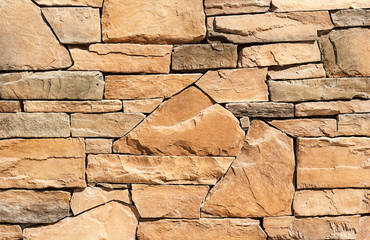 Stone wall texture or background. Brown color