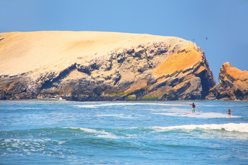 Rock formations and waves in Punta Hermosa, Peru