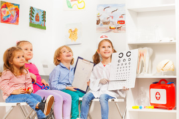 Little oculist and patients at the doctor's room