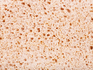 surface of pink pumice rock close up