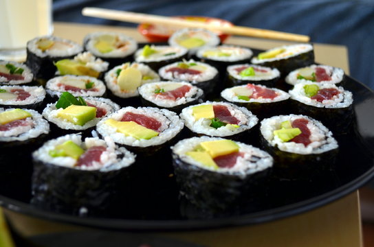 sushi rolls served on a plate