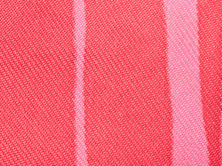 textile background - red and pink silk fabric