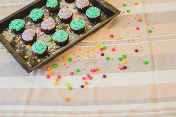 colorful cupcakes for Breakfast are on the table