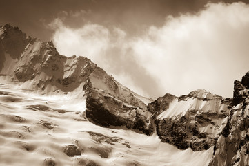 Glacier in winter mountains