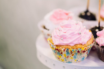 Dessert Sweet Tasty Cupcake In Candy Bar On Table. Delicious Swe