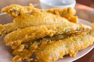 Fish fried on a plate for eating food - 109199824