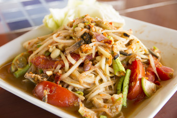 Papaya salad, Thailand foods that are spicy, a dish for a meal