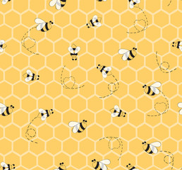 Seamless yellow pattern with bees and honeycombs background for baby textile design.