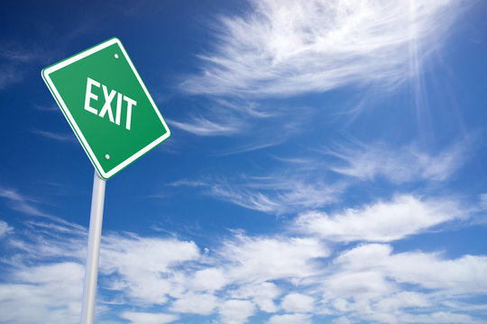 Green Road Sign with Exit Sign Inside on Blue Sky Background