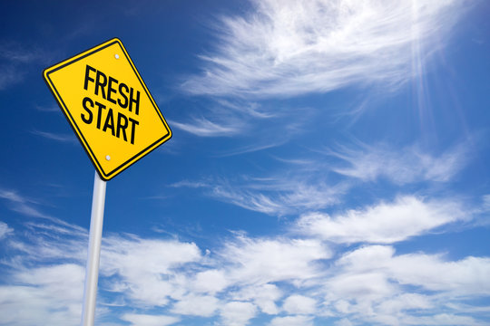 Fresh Start Yellow Road Sign with Blue Sky Background