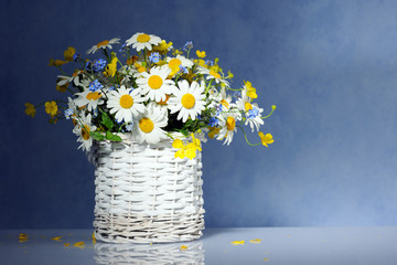 basket with spring flowers