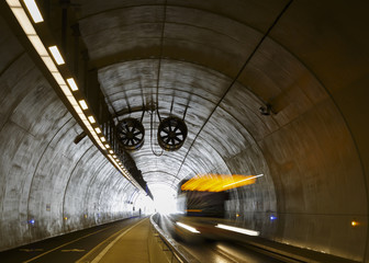 Cyclist in Tunnel de la Croix-Rousse, a new tunnel for public transports, cyclist and pedestrians in Lyon, France.