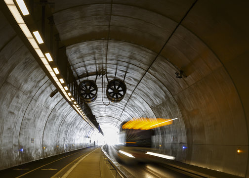 Fototapeta Cyclist in Tunnel de la Croix-Rousse, a new tunnel for public transports, cyclist and pedestrians in Lyon, France.
